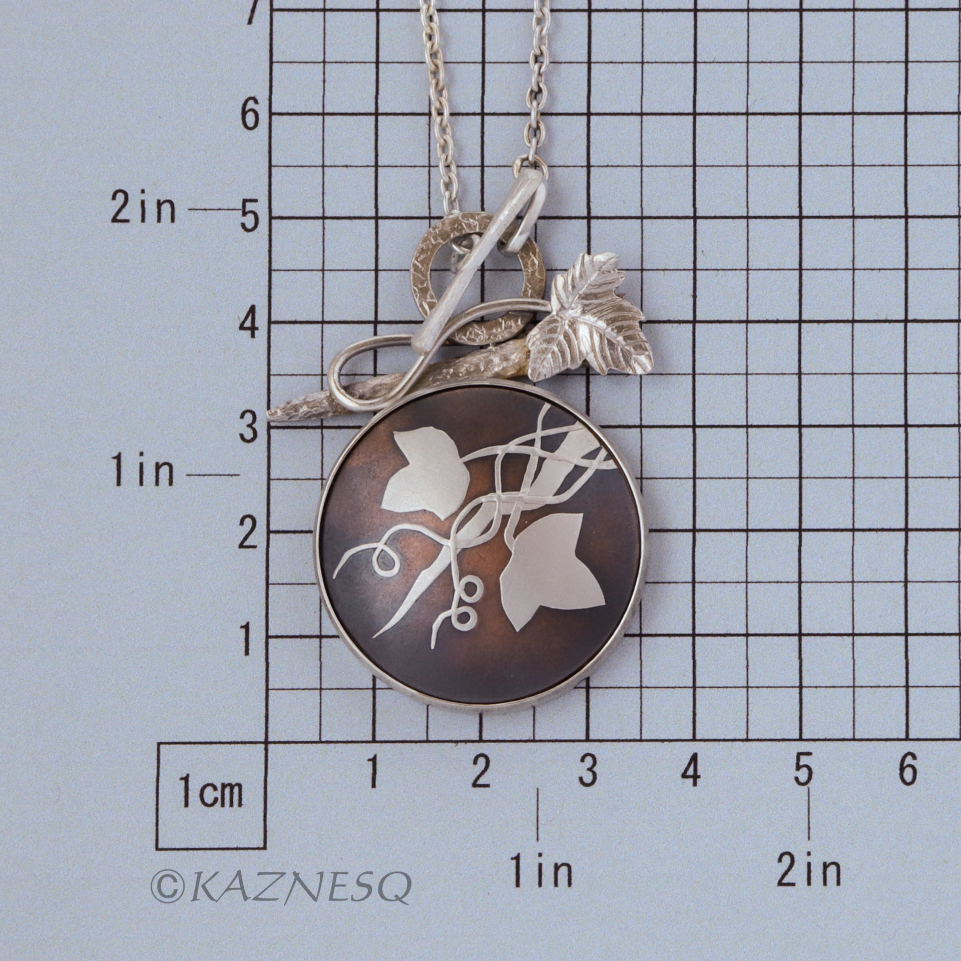 (C) KAZNESQ: Wild grape Keum Boo copper and silver necklace.