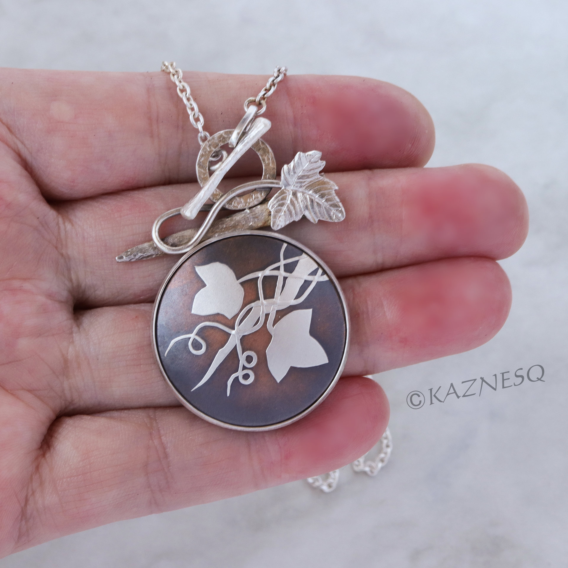 (C) KAZNESQ: Wild grape Keum Boo copper and silver necklace.