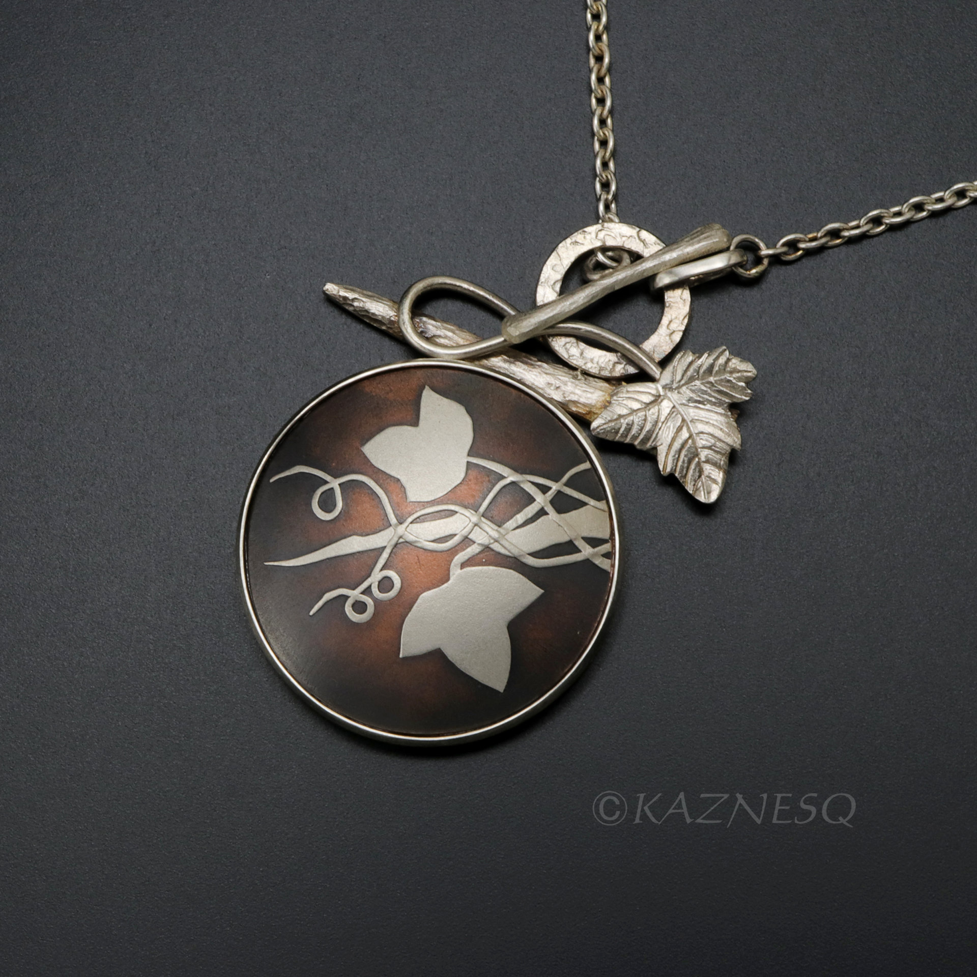 (C) KAZNESQ: Wild grape Keum Boo copper and silver necklace.