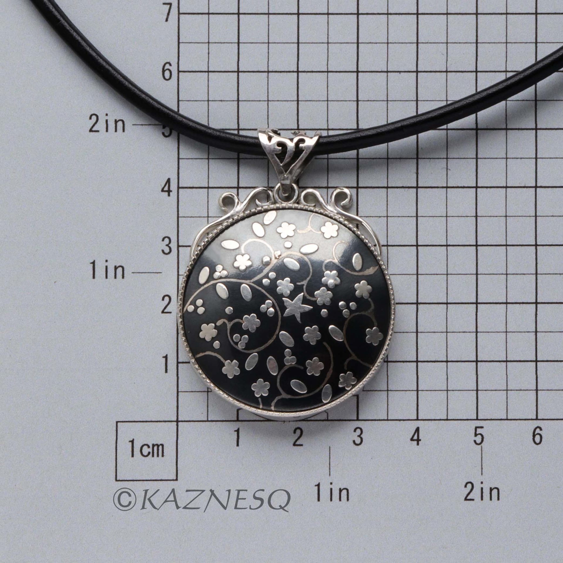(C)KAZNESQ: Black copper and silver flower necklace