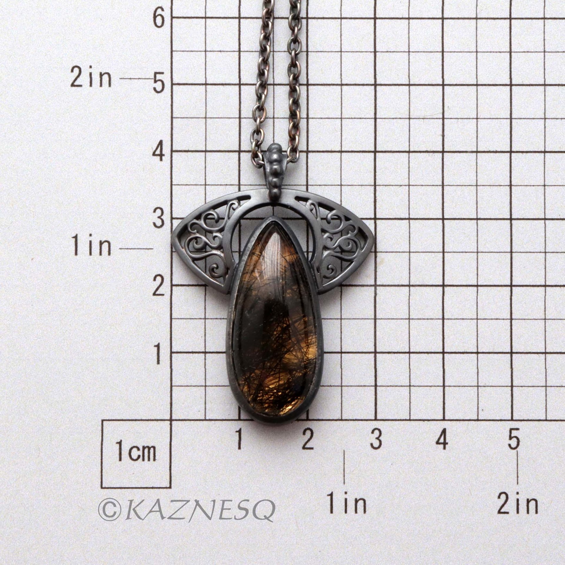 (C)KAZNESQ: Black tourmaline quartz lined with gold oxidized silver necklace