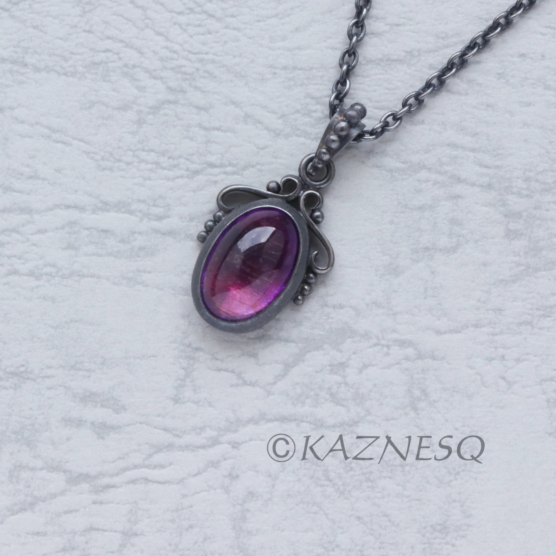 SOLD: Art Nouveau style amethyst cab oxidized silver pendant necklace with gold lining