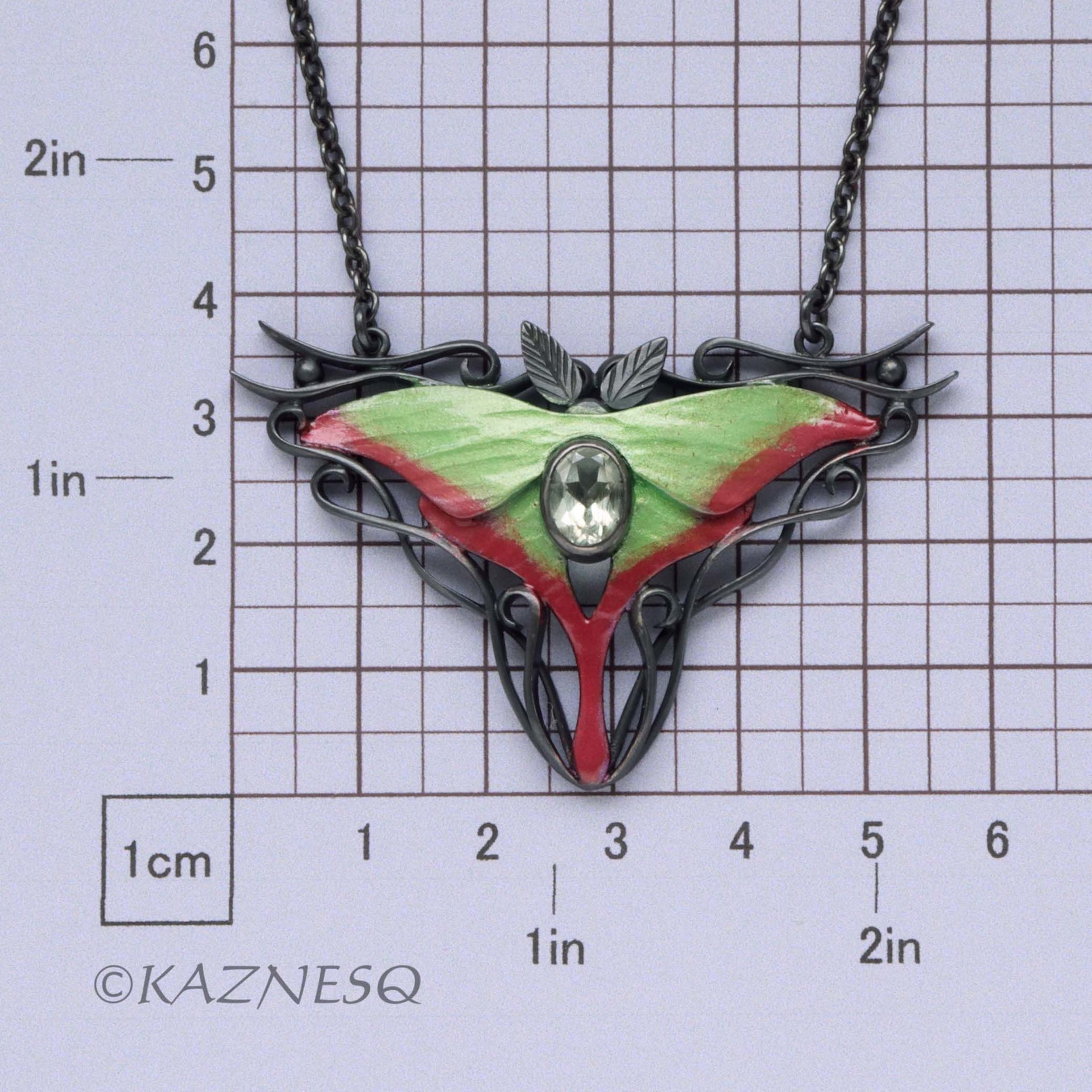(C) KAZNESQ: Moon Moth colored silver pendant necklace with green quartz.