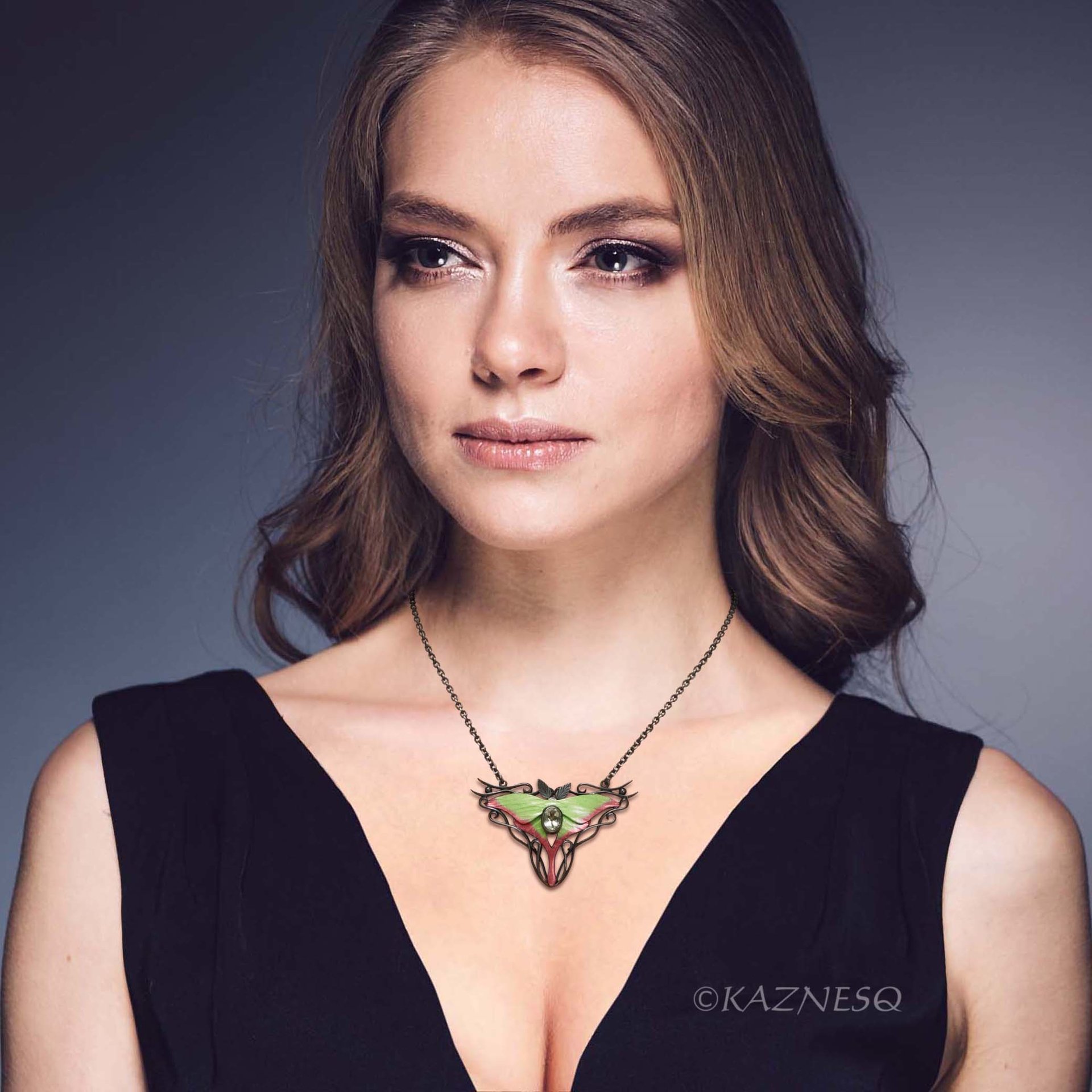 (C) KAZNESQ: Moon Moth colored silver pendant necklace with green quartz.