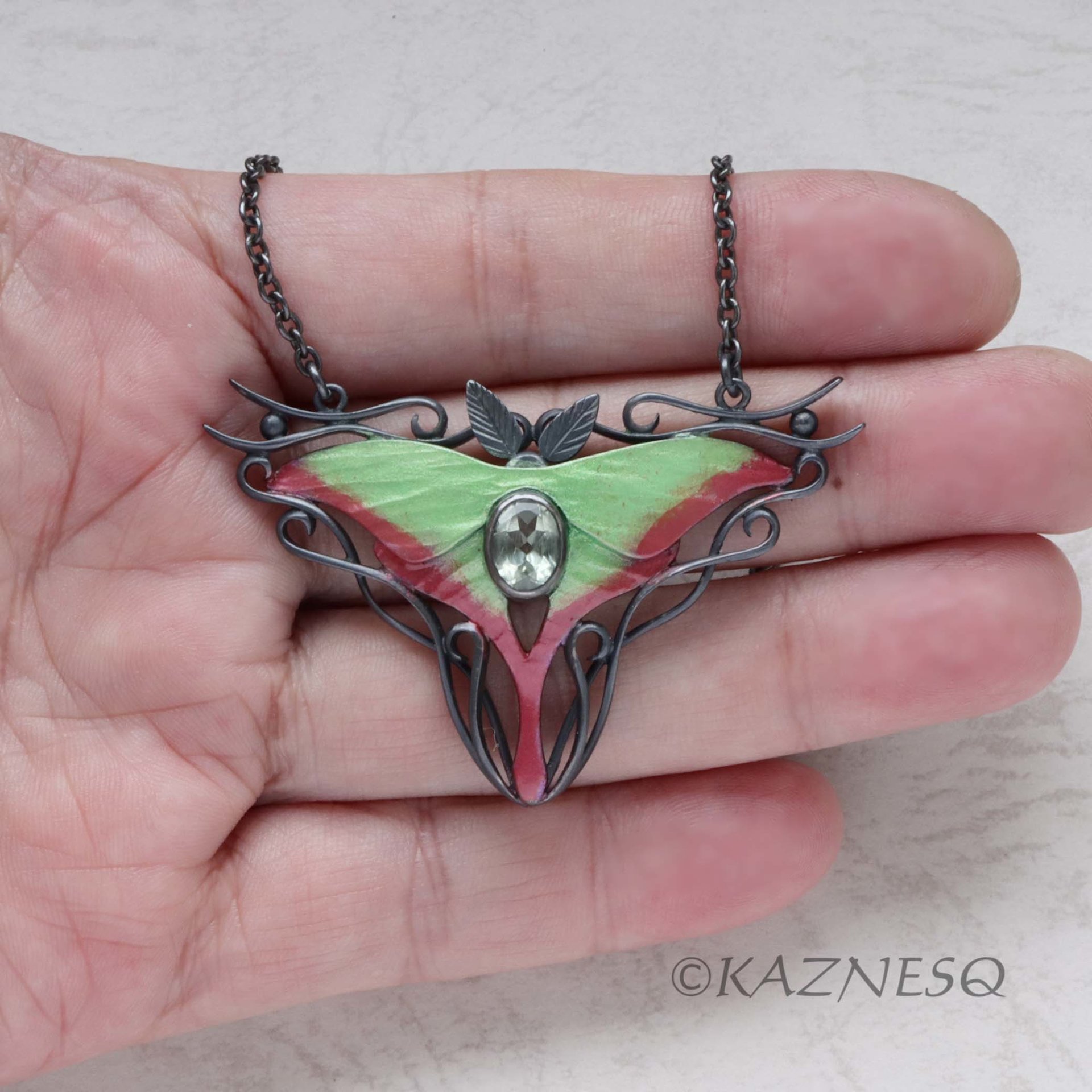 (C) KAZNESQ: Moon Moth colored silver pendant necklace with green quartz.