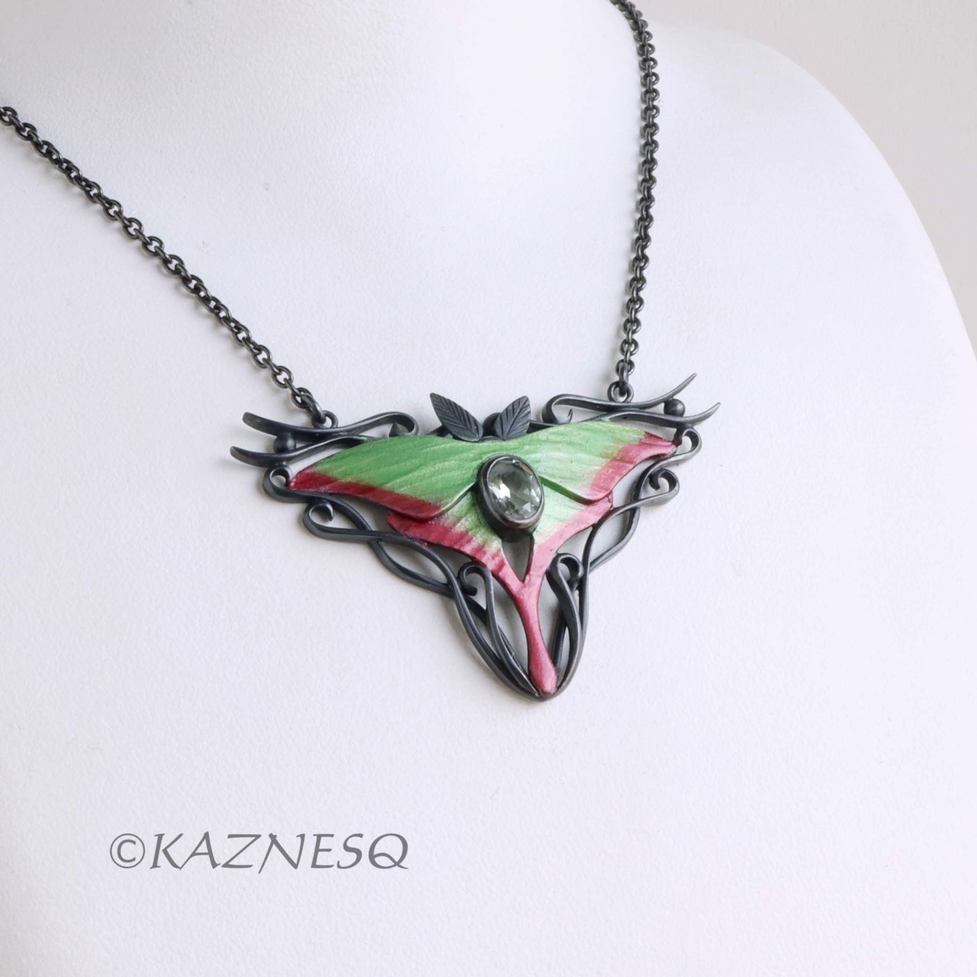 (C) KAZNESQ: Moon Moth colored silver pendant necklace with green quartz.
