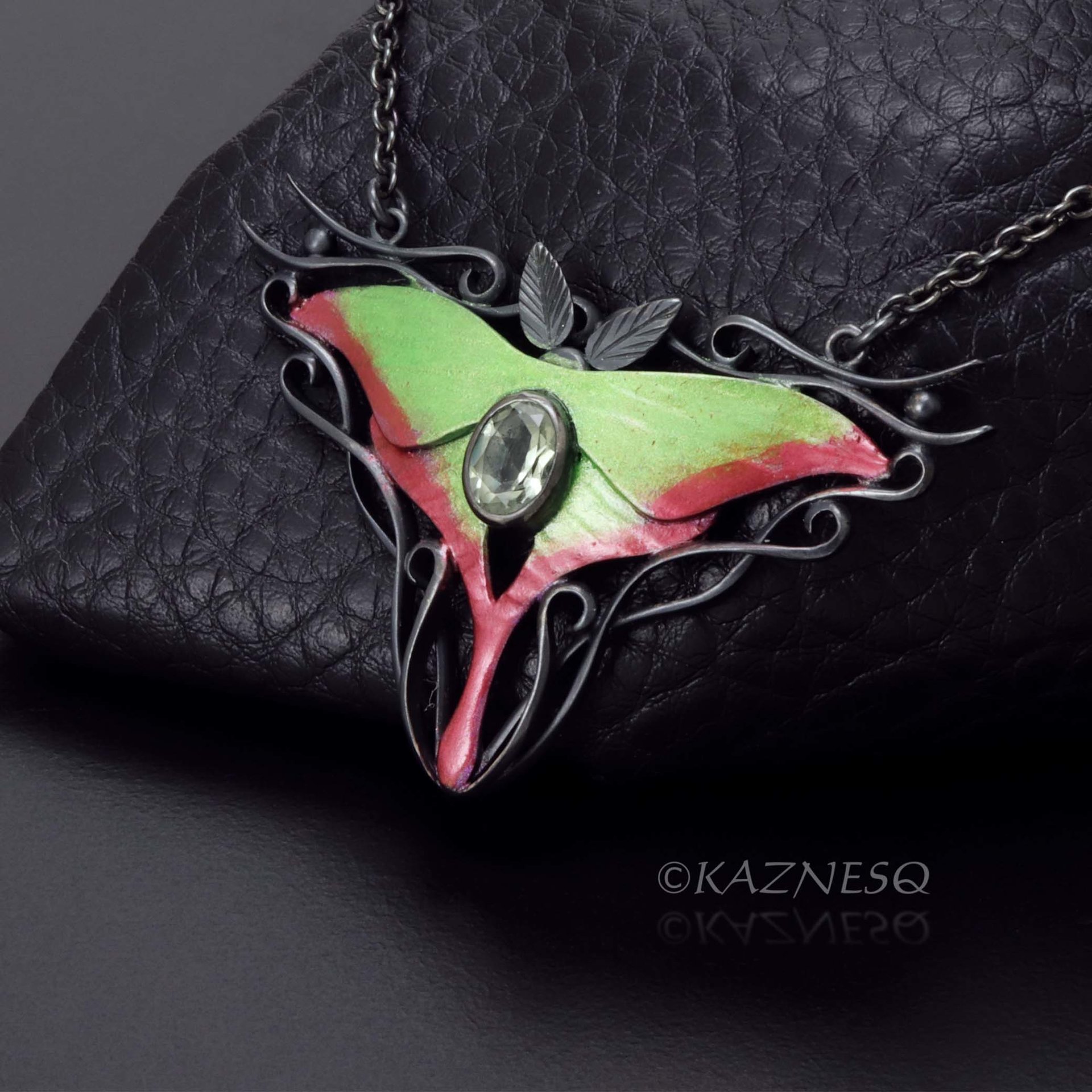 (C) KAZNESQ: Moon Moth colored silver pendant necklace with green quartz.