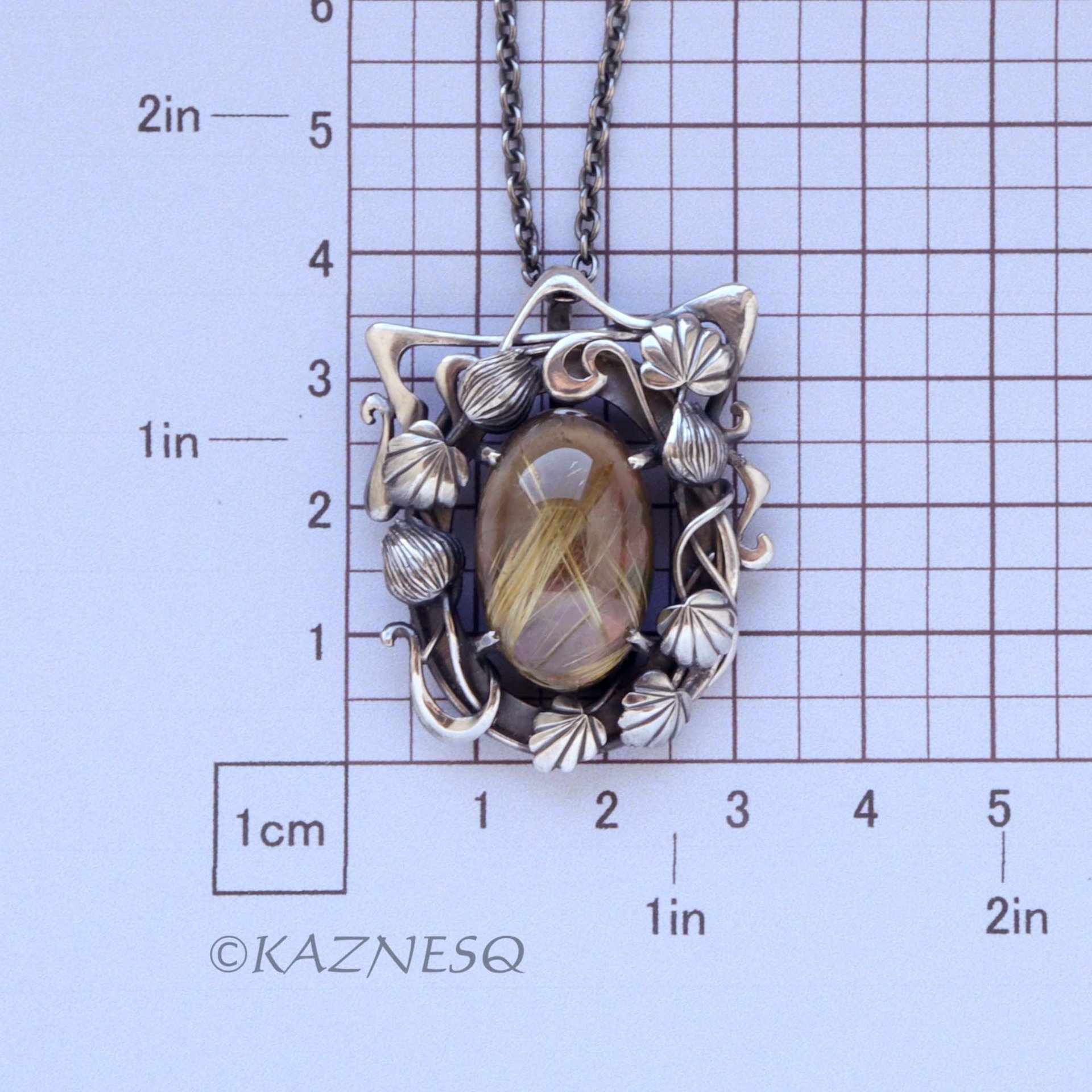(C) KAZNESQ: Rutilated Quartz with Mother of Pearl Oxidized Silver decorated Fra