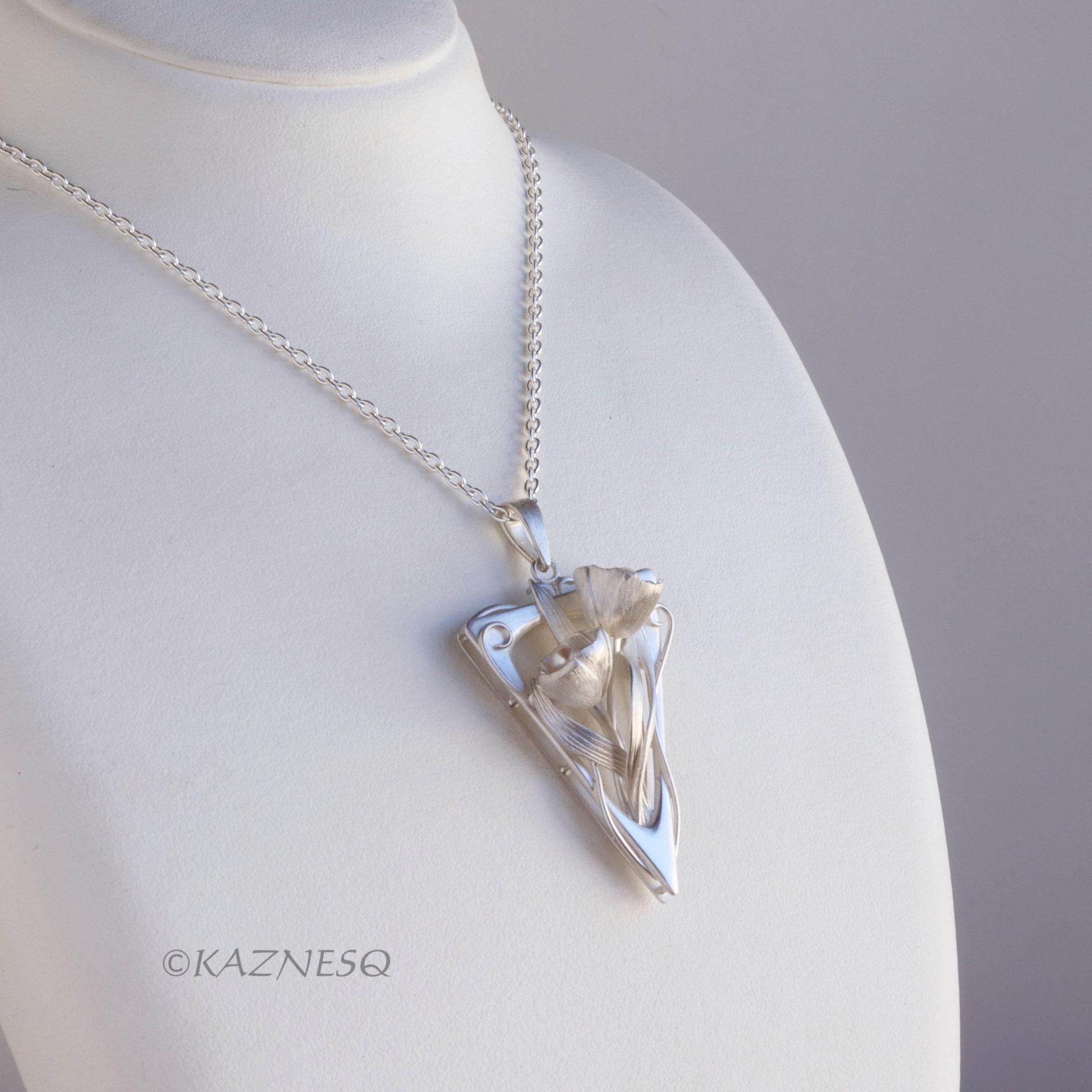 (C) KAZNESQ: Art Nouveau style Floral triangle silver pendant with Akoya Pearls.
