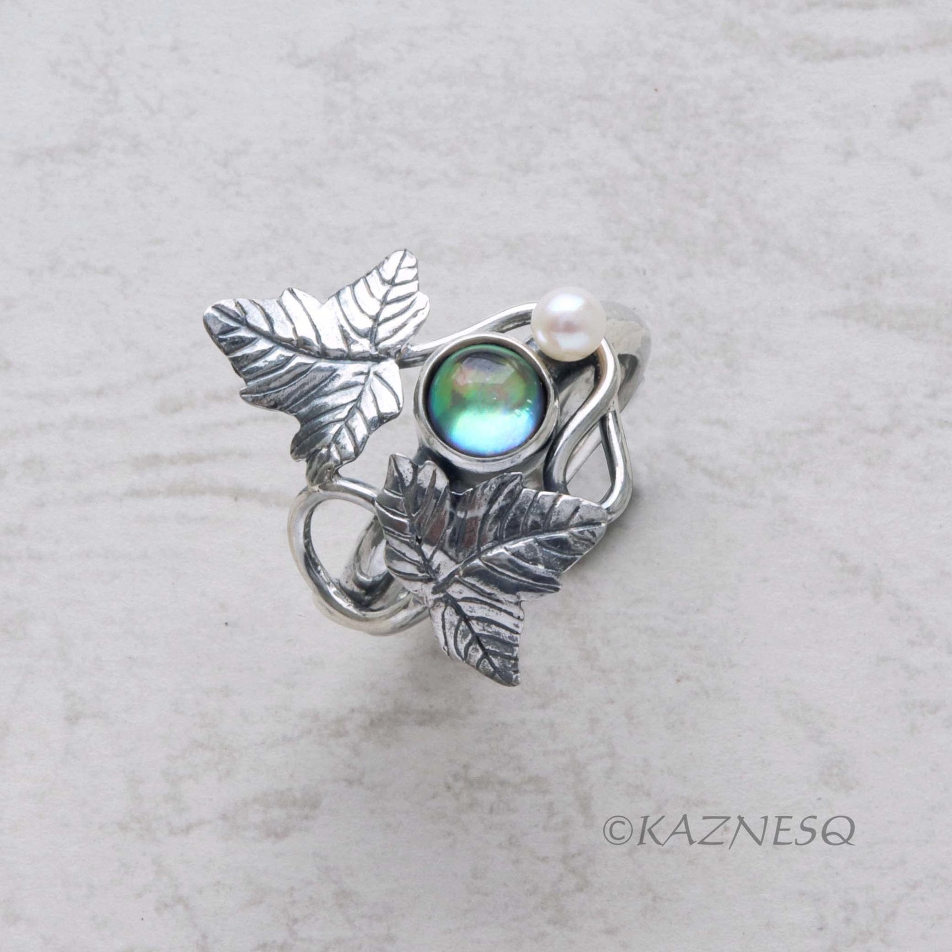 (C) KAZNESQ: Quartz lined with Paua shell Leaf motif Art Nouveau style silver ri
