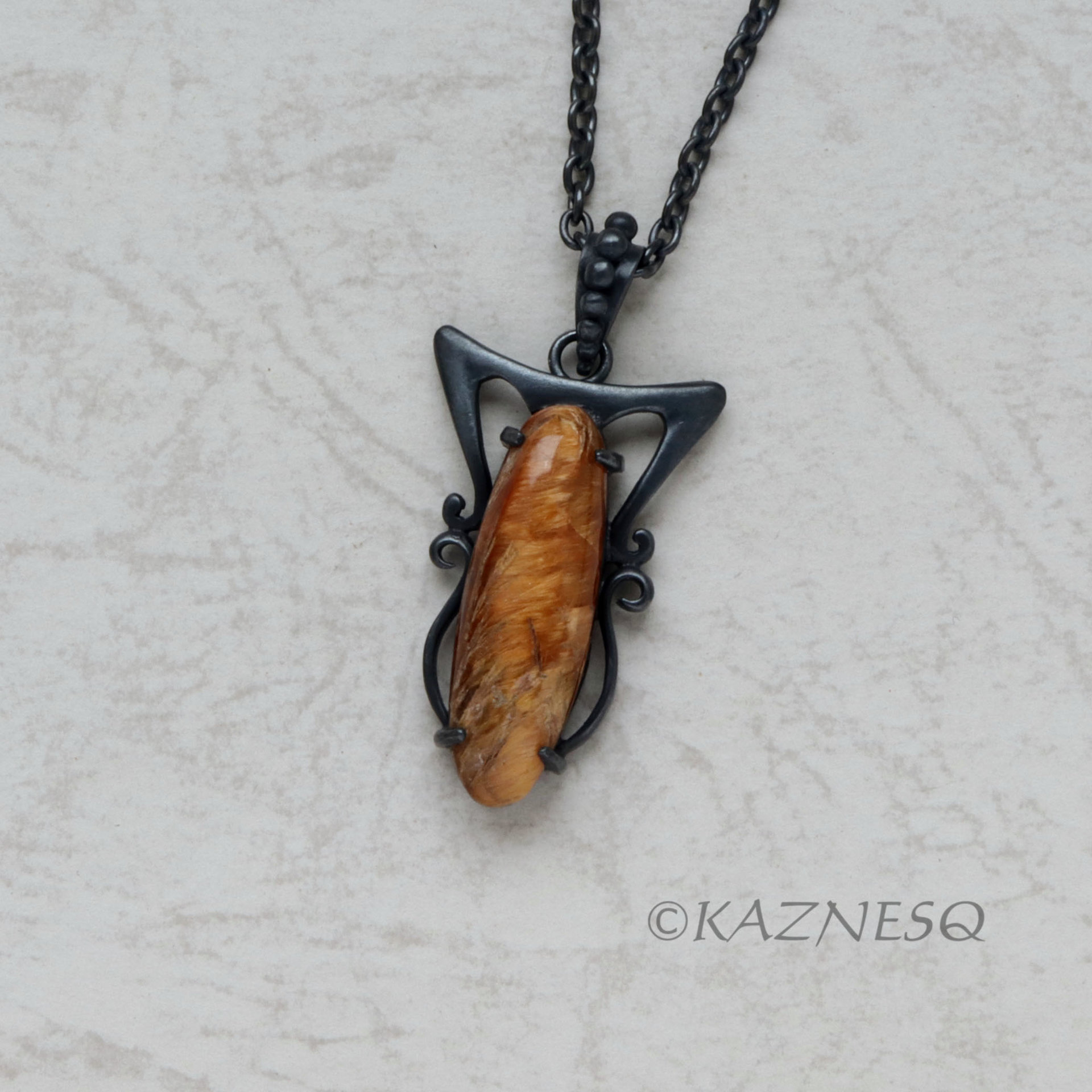 (C) KAZNESQ: Art Nouveau style Long Oval Rutilated Quartz oxidized silver pendan