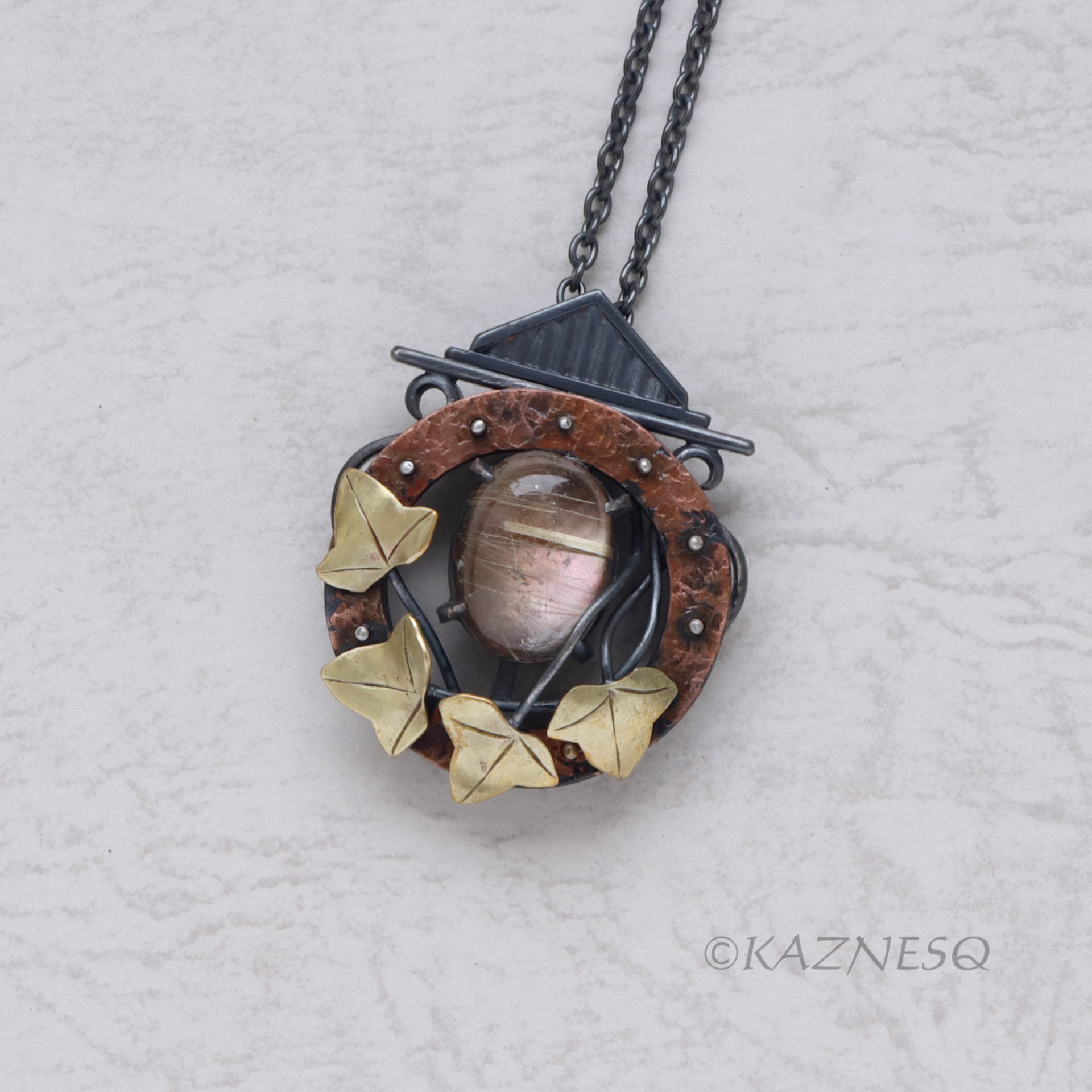 (C) KAZNESQ: Rutilated quartz and Mother of pearl round copper clock, brass leav