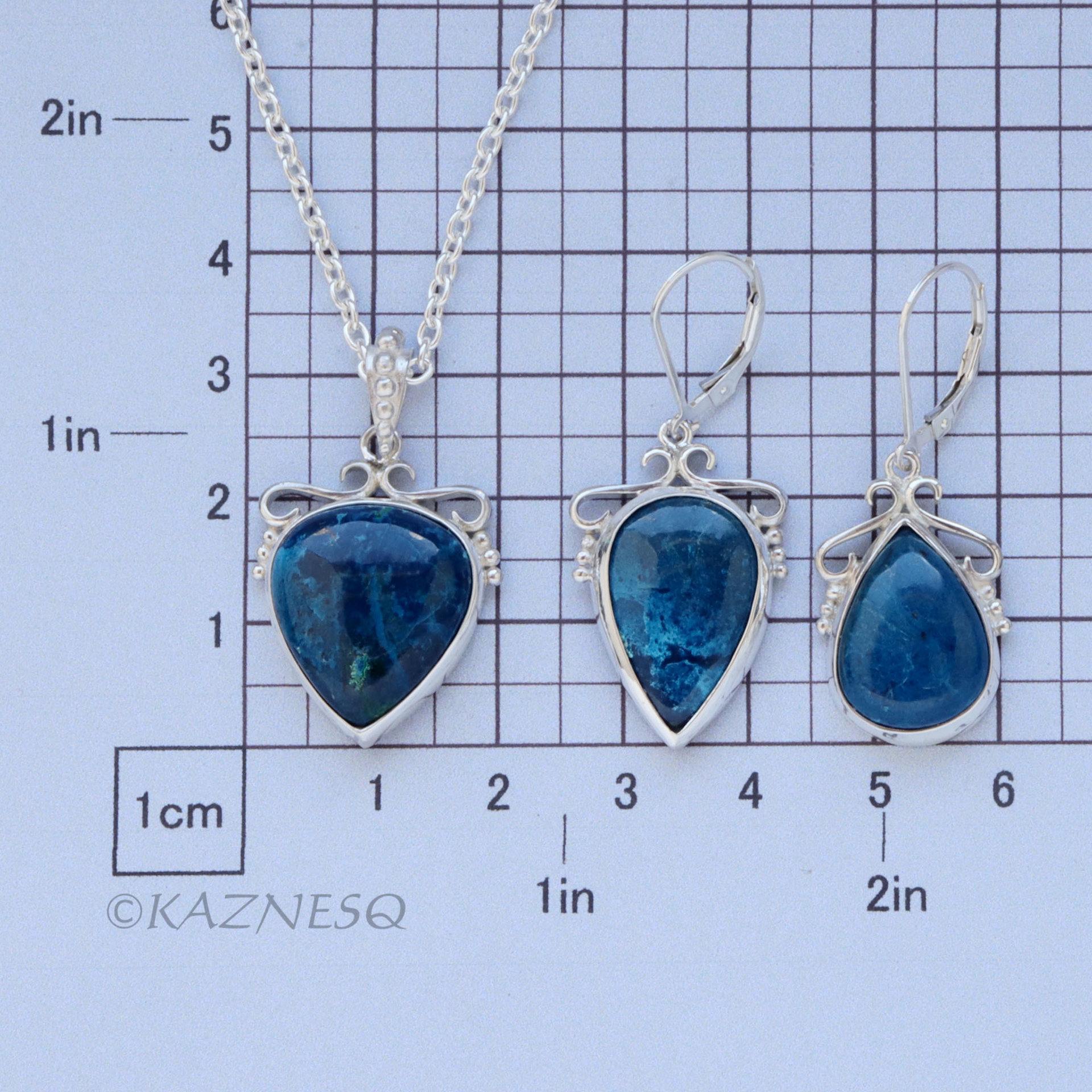 A set of Shattuckite Silver Earrings and a Necklace.