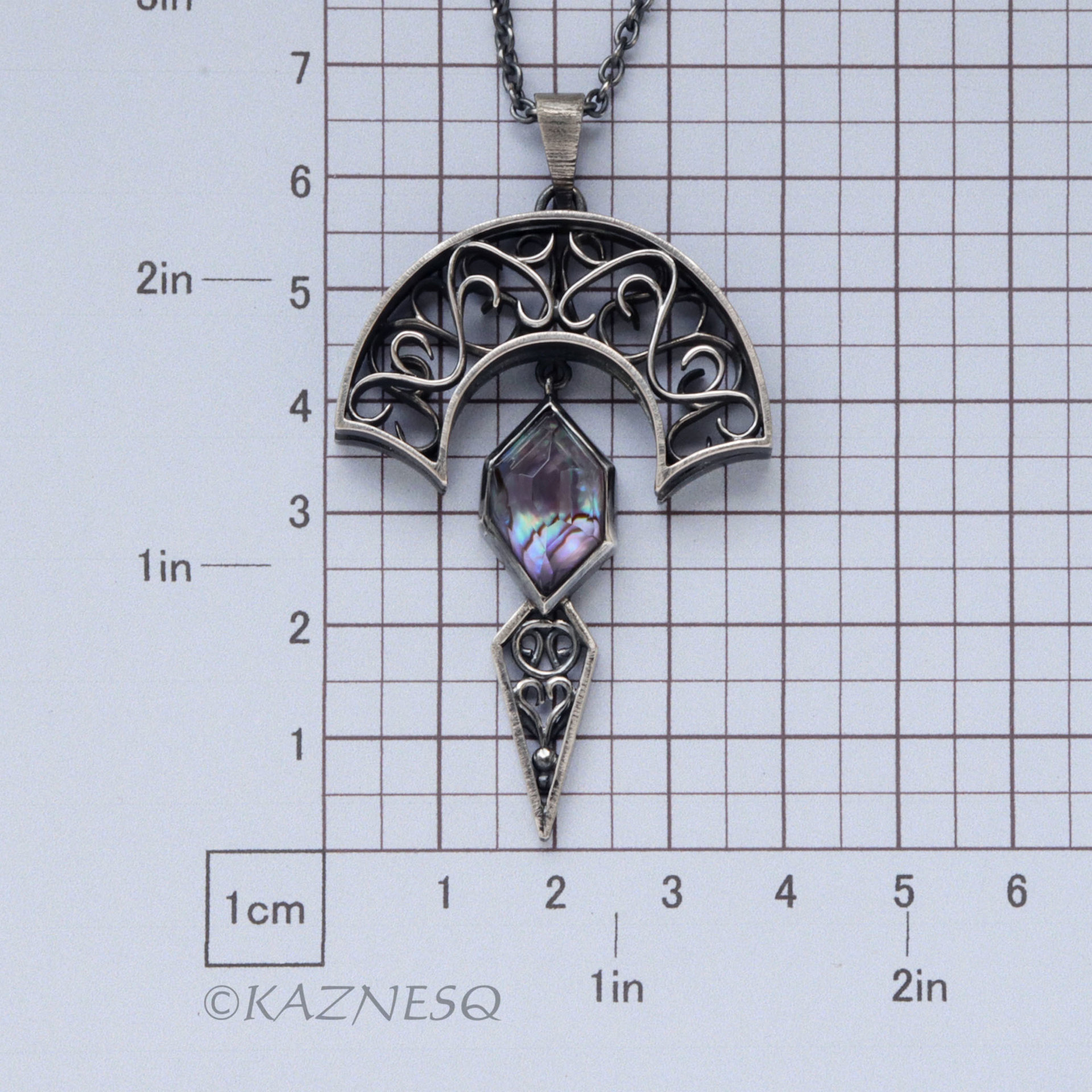 Art Nouveau style Arch pendant necklace with amethyst lined with Paua shell