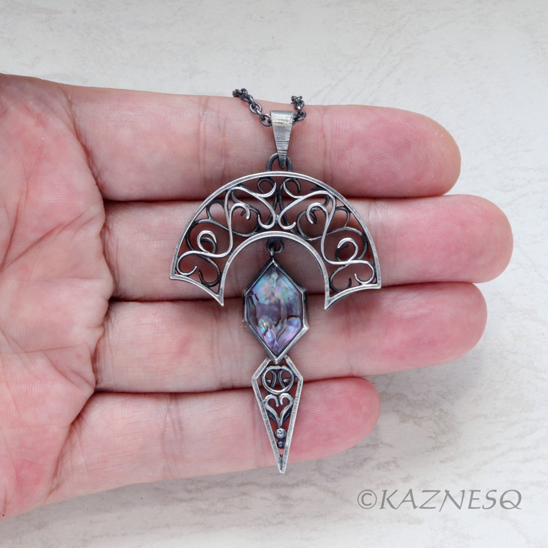 Art Nouveau style Arch pendant necklace with amethyst lined with Paua shell