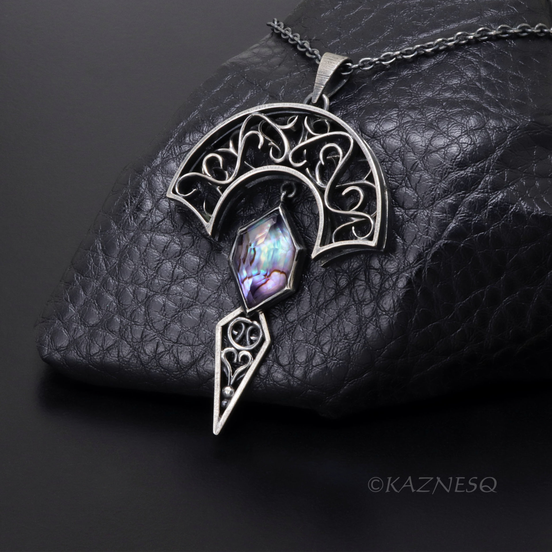 Art Nouveau style Arch pendant necklace with amethyst lined with Paua shell