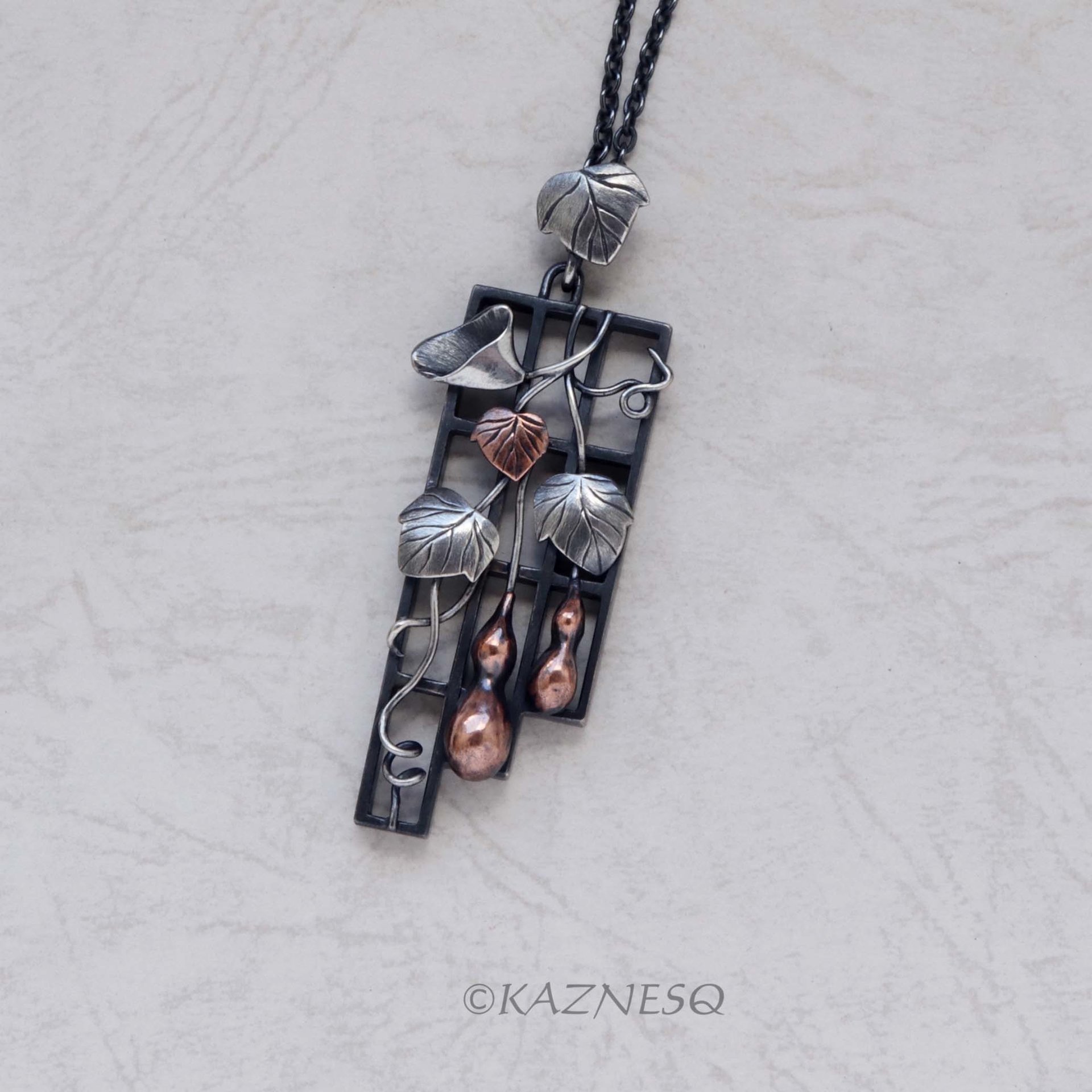 Gourd motif silver and copper leaf pendant necklace wabi sabi.