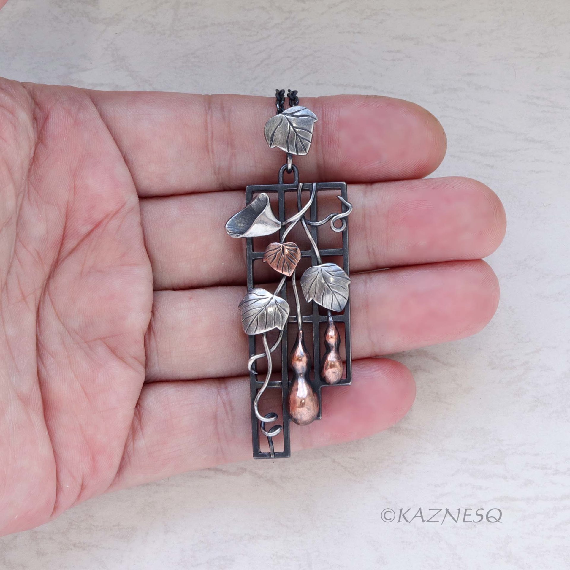 Gourd motif silver and copper leaf pendant necklace wabi sabi.