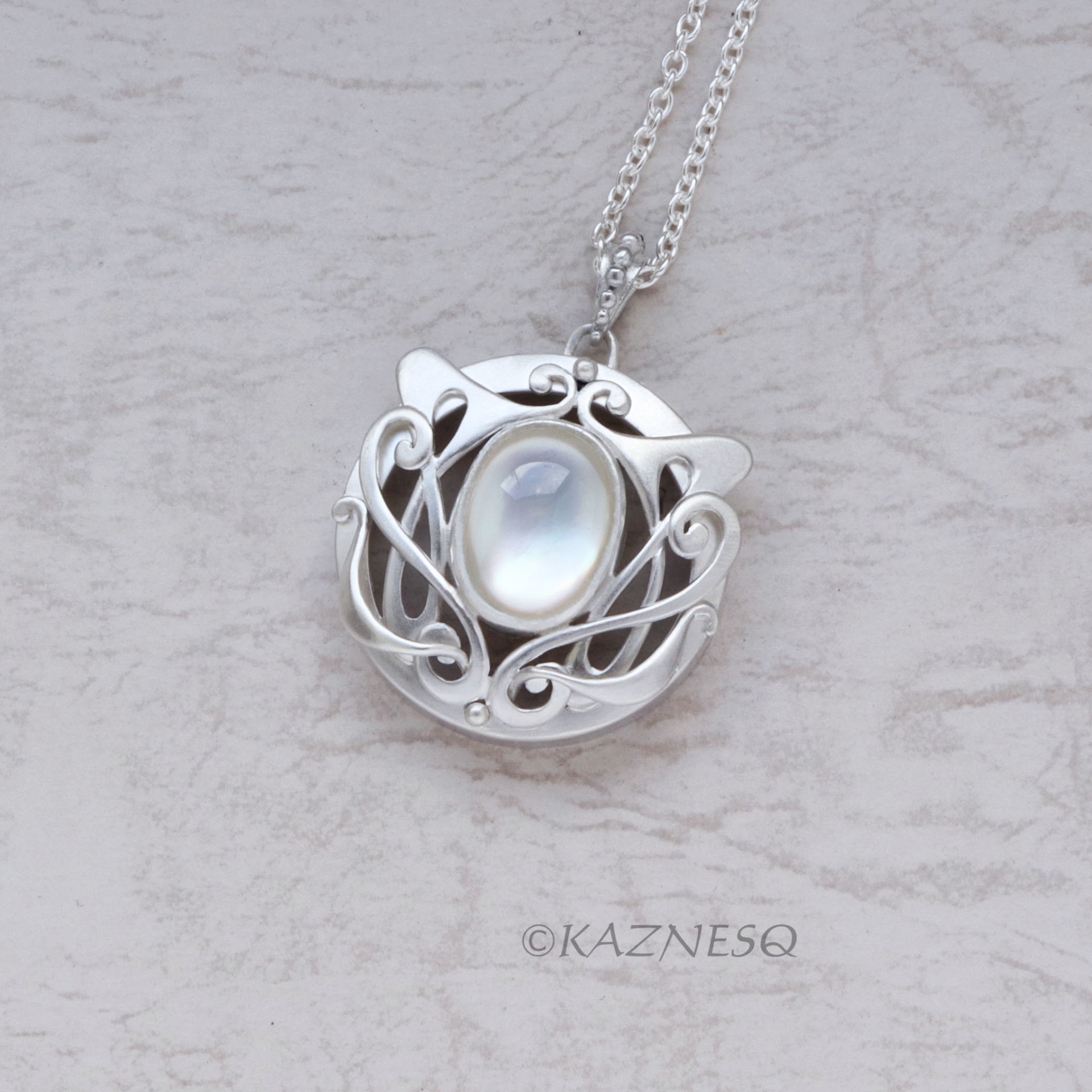 Art Nouveau style matte finished Silver and Quartz lined with Mother Of Pearl Pendant Necklace