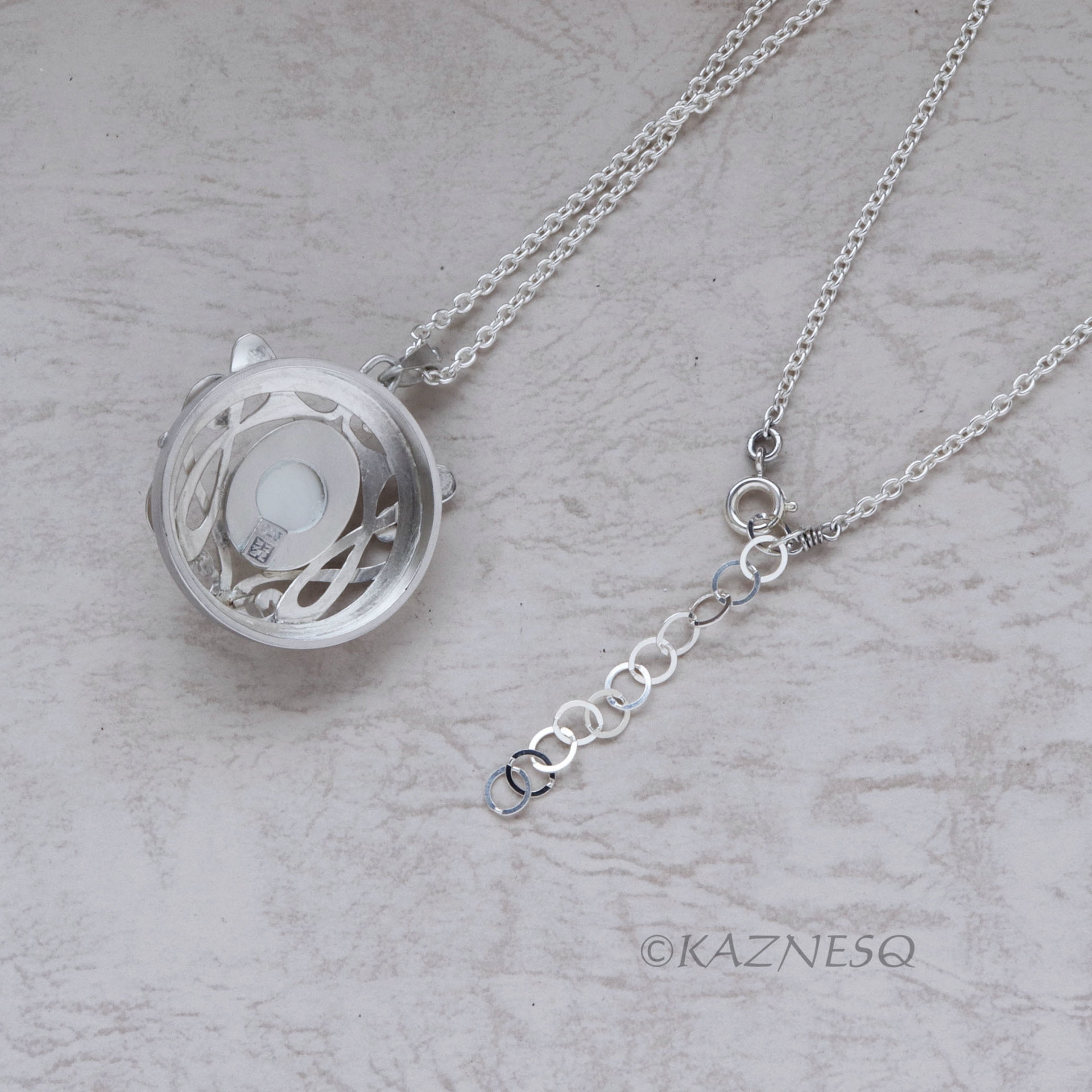 Art Nouveau style matte finished Silver and Quartz lined with Mother Of Pearl Pendant Necklace