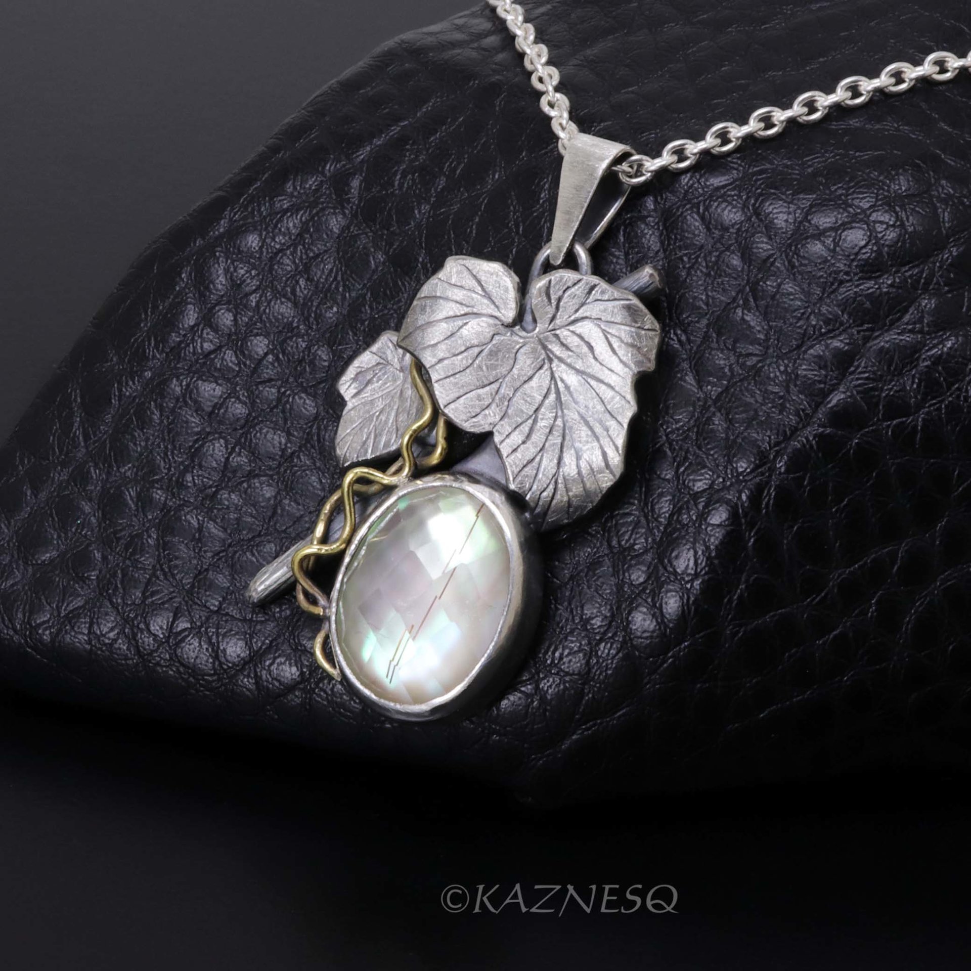 Mystical Brilliance! Silver Leaf Pendant with Rutilated Quartz Backed by Mother of Pearl