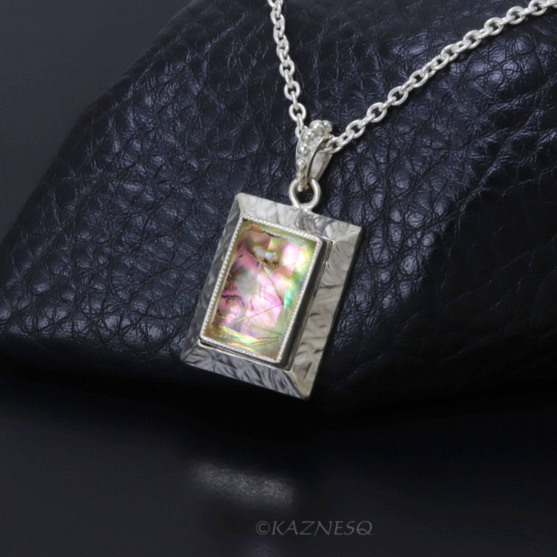 Alluring iridescence! : Rutilated Quartz with Paua Shell Rectangle Silver Pendant