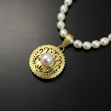 SOLD: Gold silver round pendant with a pearl necklace