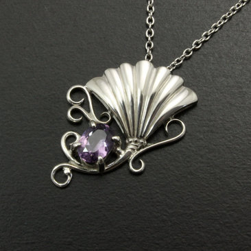Sold: Purple spinel featured silver pendant of an imaginary flower
