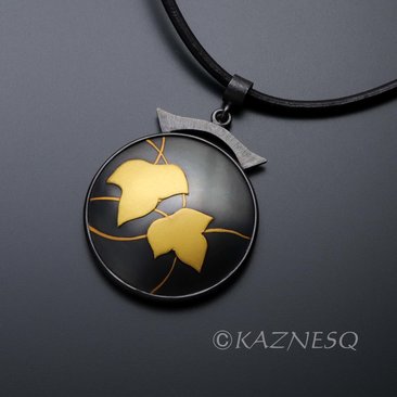 (C) KAZNESQ: Ivy Keum Boo circle pendant of oxidized silver