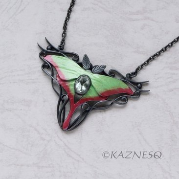 (C) KAZNESQ: Moon Moth colored silver pendant necklace with green quartz.