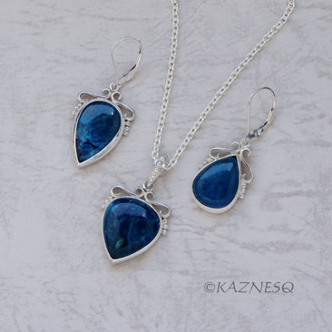 A set of Shattuckite Silver Earrings and a Necklace.